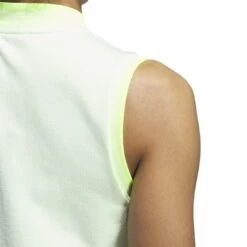 Adidas Women's Ultimate365 Tour PRIMEKNIT Sleeveless Polo 2023 - White 14 Adidas Women's Ultimate365 Tour PRIMEKNIT Sleeveless Polo 2023 - White -golf hy7207 9 apparel on model detail view 2 white